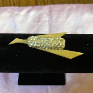 Celluloid brooches with rhinestones 3”